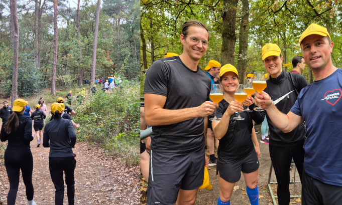 Groep mensen in het bos bij Biertrail Gorp en Roovert met sportkleding en bier.