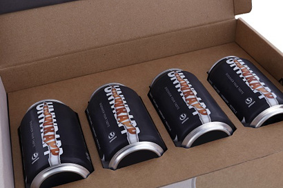 Vier ingepakte blikjes in het Unwrapp bierpakket