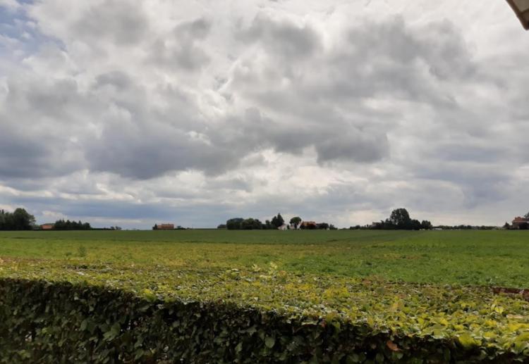 Uitzicht vanaf het terras van In de Vrede in Westvleteren