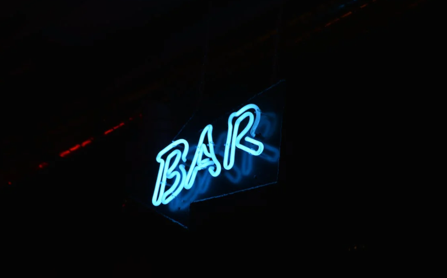 bar in neonletters / Pexels bar in neonletters