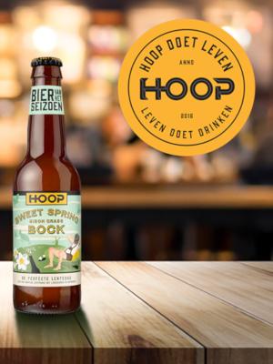 Hoop bierfles en logo ernaast