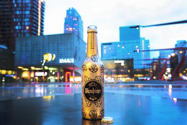 Warsteiner IFFR 2016 fles met Stadsschouwburg Rotterdam