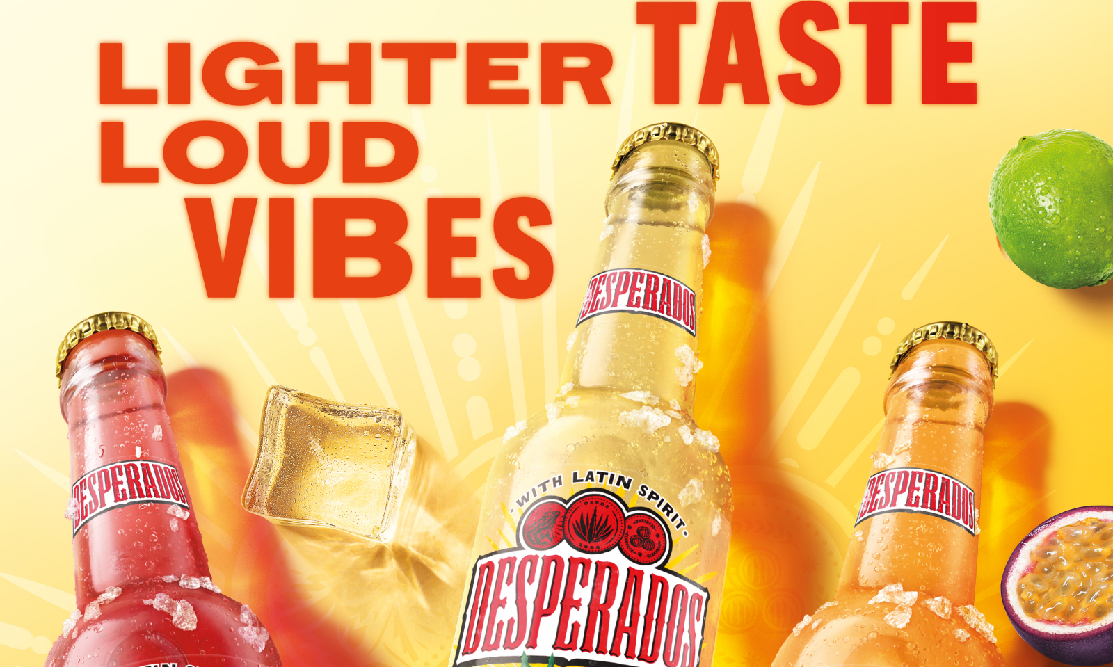 Drie flessen Desperados met een citroen en limoen op een kleurrijke achtergrond met de tekst 'Lighter Taste Loud Vibes'.