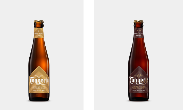Twee Tongerlo bierflessen met gouden en donkerrode labels op een lichte achtergrond.