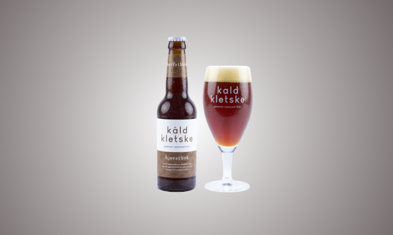 Kâld Kletske Hjerstbok fles en glas