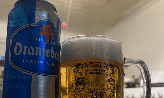 Oranjeboom blik en pul Oranjeboom blik en pul