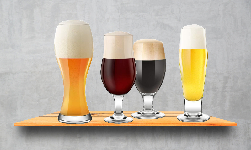 vier biersoorten op een plankje